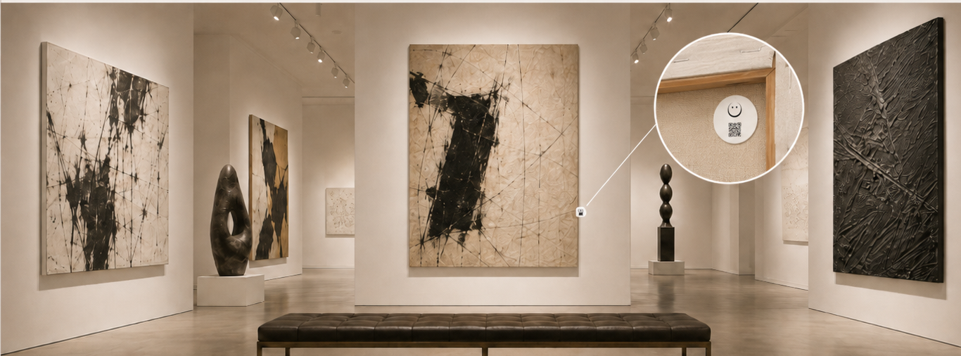 A warm contemporary gallery with artworks, sculpture and a circular close-up of a VeraTag QR label on the back of a canvas